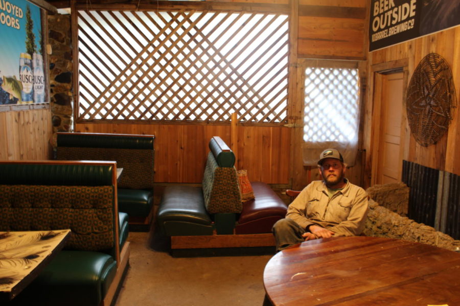 A Tiller resident enjoys a meal inside the Pit Stop recently. It offers snacks, food and a beer garden for adults.