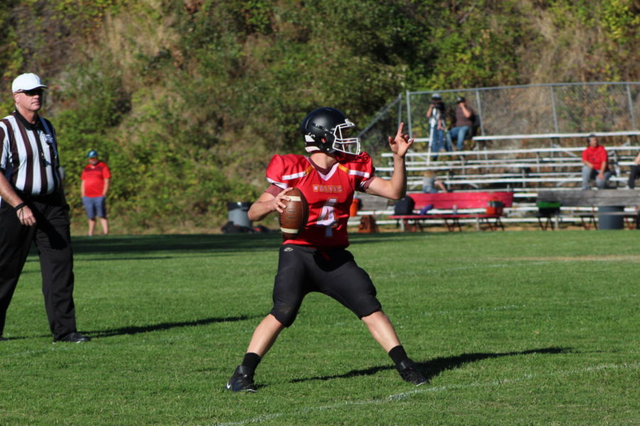 Wyatt+Geiger%2C+playing+against+North+Lake+earlier+in+the+season%2C+threw+for+237+yards+and+three+touchdowns+in+the+win+over+Glendale.