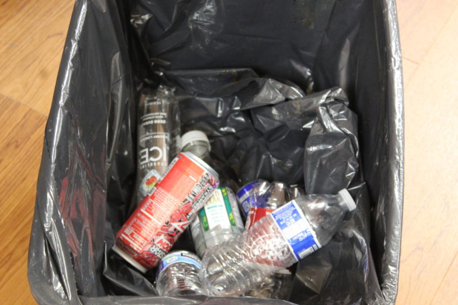 The bottle return bin in the high school hall at Days Creek Charter School