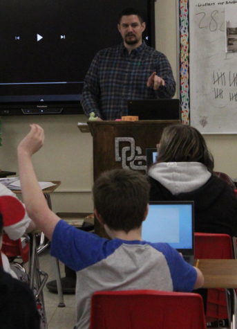 Mr. Giles questions sixth graders in his Social Studies 6 class earlier this year. On block days, this class meets for an hour, breaks for lunch, then returns to class for 43 minutes.