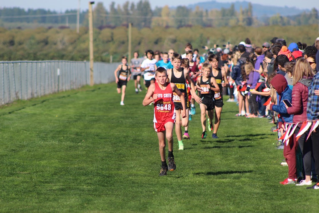 Boe McNeely leads the field at the Stumptown Youth XC championships Oct. 29 in Monmouth. The 7th-grader beat a field of more than 400 runners.