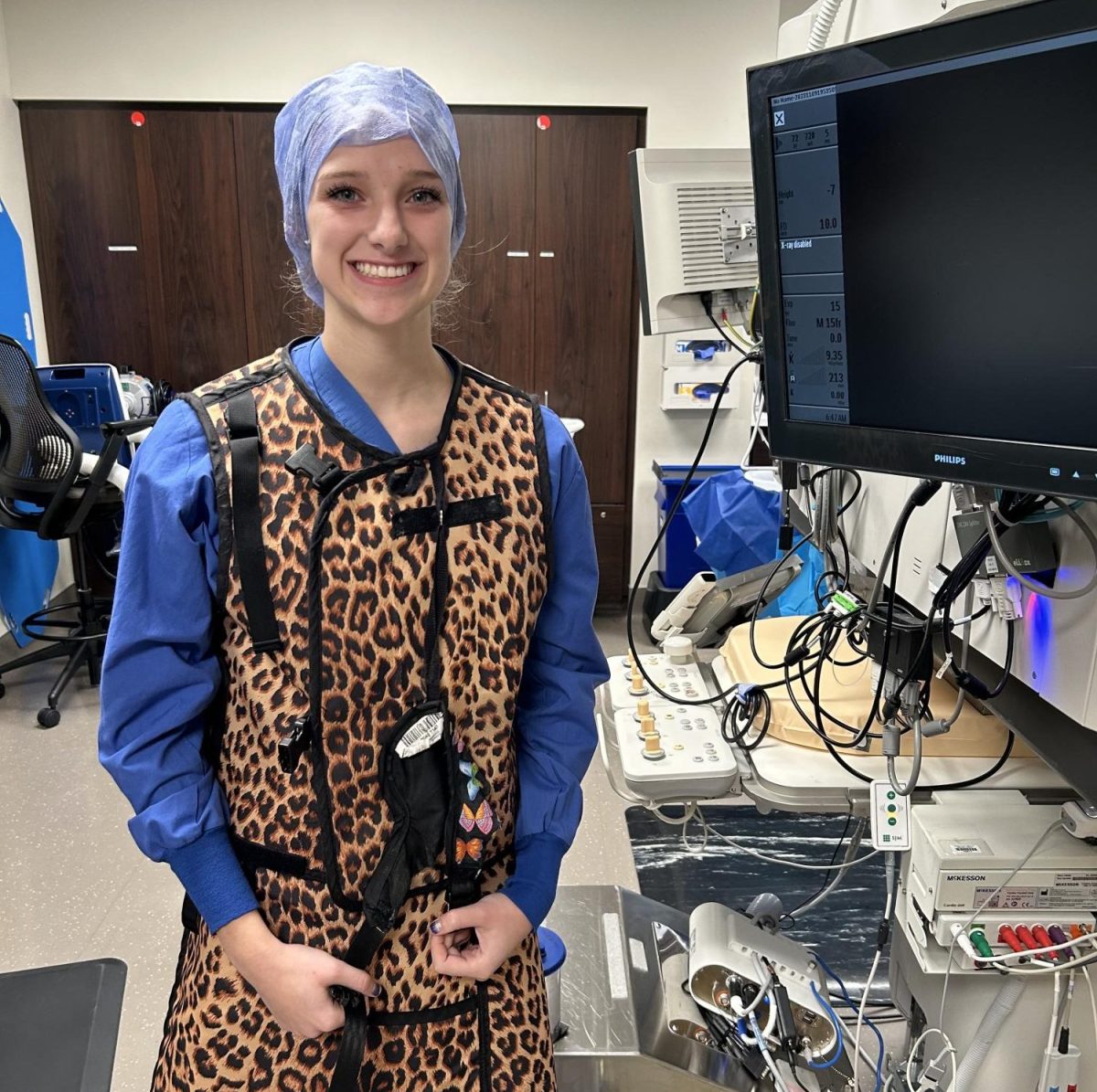 McKenzie Park wears protecting equipment during her job shadow at the cardiac catheterization lab at Asante Medical Center in Medford.