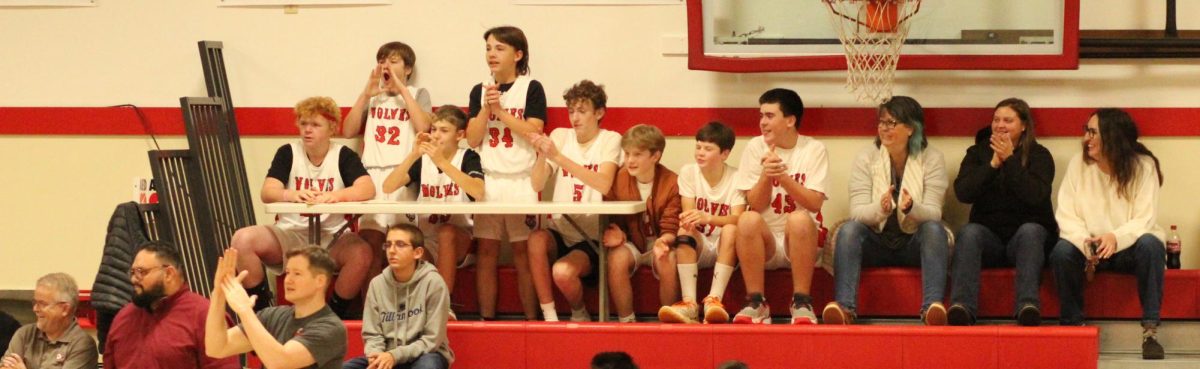 Days Creek A team players cheer on the B team during a game against Riddle. Both the A and B teams are 5-2 this fall.