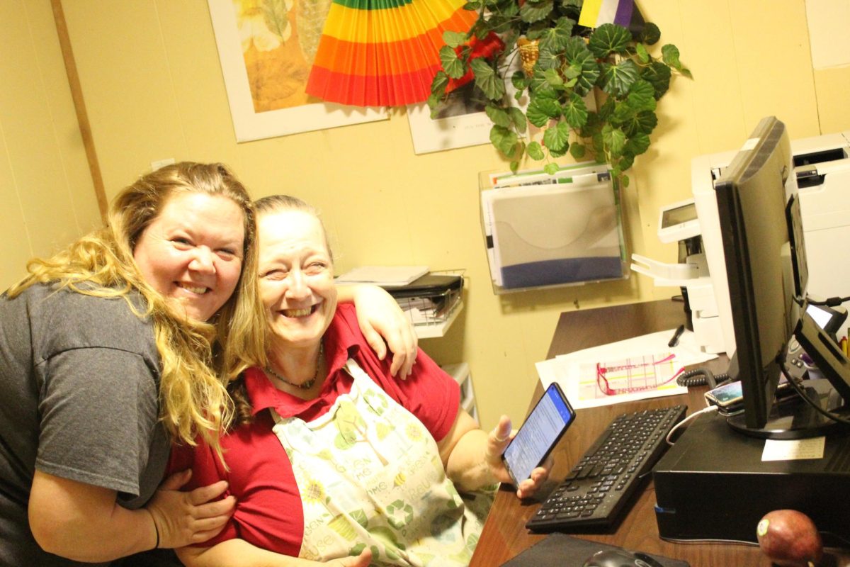 Angela Gosso, left, poses with former lunch lady Sarah Luster. 