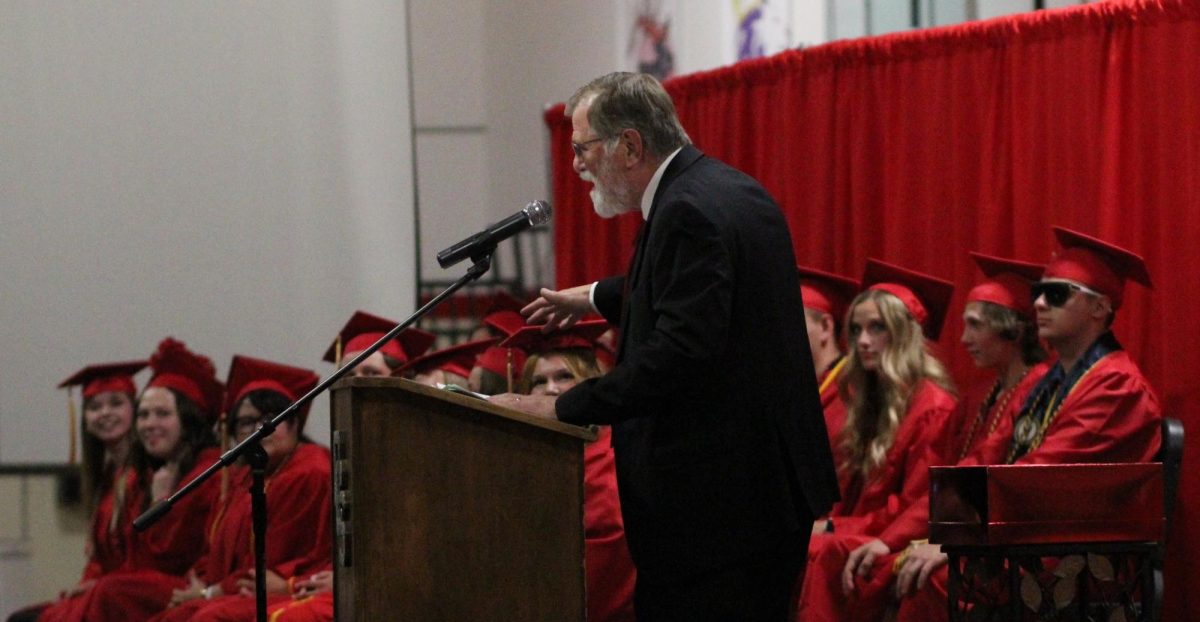 Joe La Fountaine delivers the keynote address of the graduation ceremonies for the Class of 2024. La Fountaine announced his retirement on Monday.