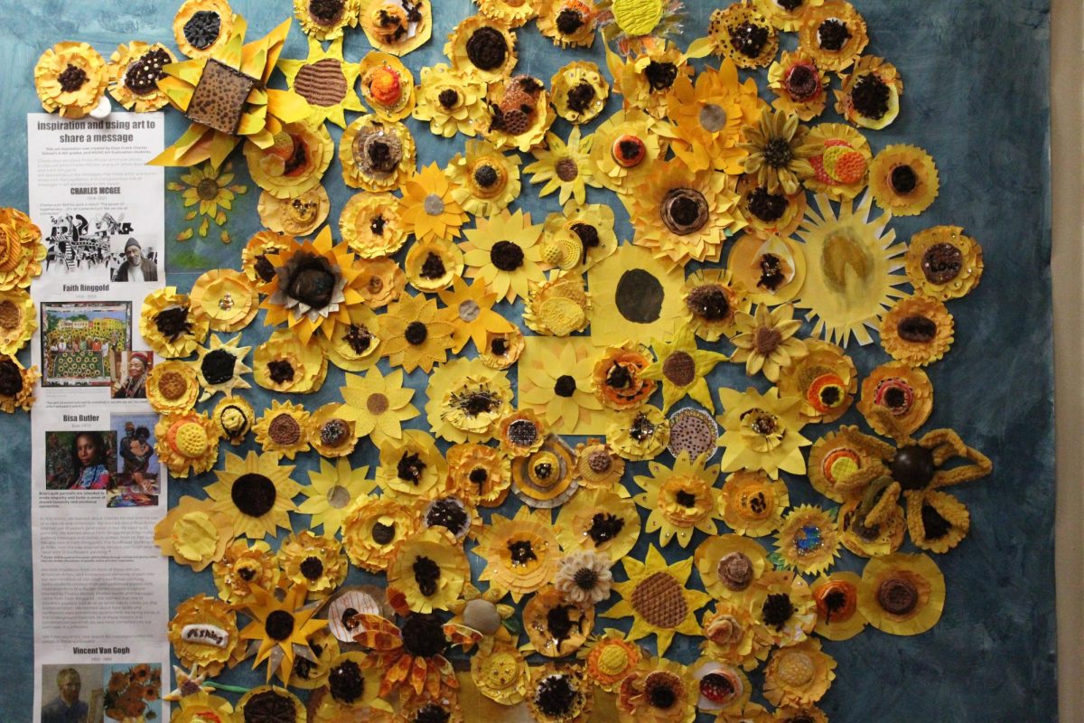 Sunflowers created by Days Creek Charter School art students on display in the high school hall. 
